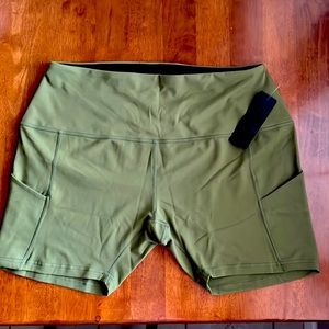 Odorous green workout shorts